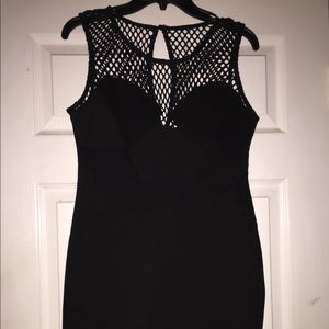 black halter like dress with fish net on chest